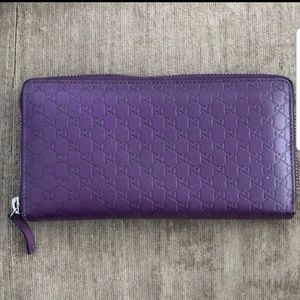 Authentic Gucci Monogram zipper wallet